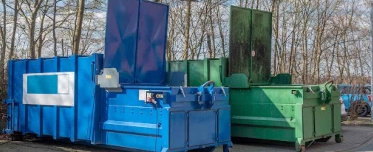 Two waste compactor machine