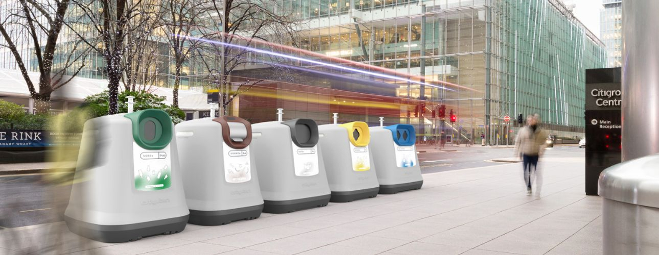 Row of modern garbage bins 